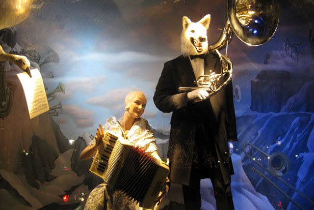 Nothing says the holidays like a French horn-playing wolf, and a duck holding sheet music.